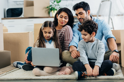 Latina family on a telehealth meeting.